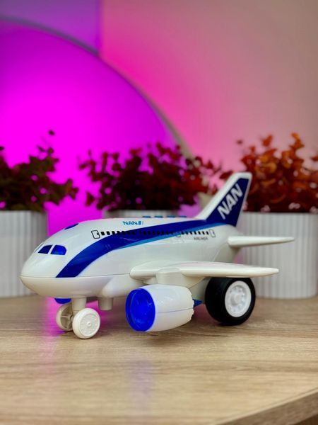 Дитяча іграшка Літак із підсвічуванням і звуковими ефектами Інерційний Білий із синім 44126 фото