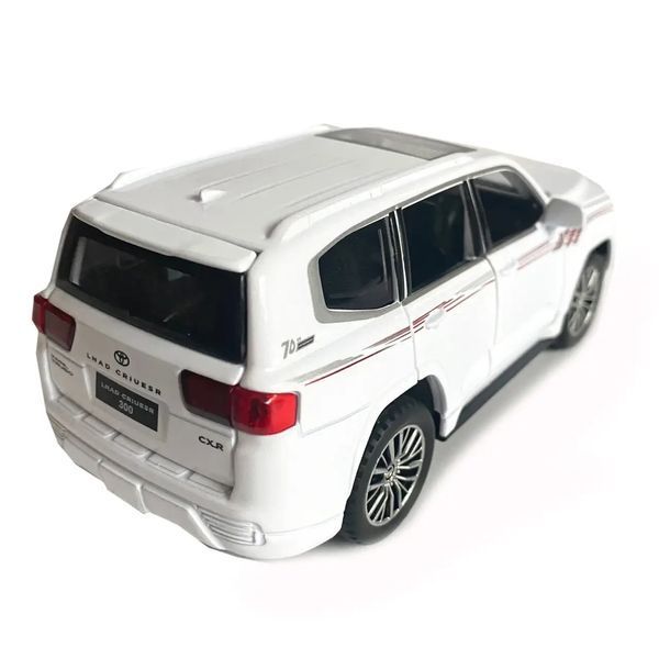 Металлическая машинка инерционная с эффектами Toyota Land Cruiser 300 Auto Expert Белый 36752 фото